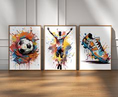 three framed art prints depicting soccer players with their arms in the air and one holding a ball