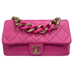 Chanel signed bag, line 19, made in pink smooth leather with golden hardware. The bag is equipped with a flap with interlocking CC logo closure, internally lined in gray fabric, quite roomy. Equipped with a central handle in chain and a shoulder strap in leather and braided chain to wear the bag over the shoulder. Year of production 2021/22, comes with original card. Good condition, light marks on the leather. Rectangular Pink Bag With Chain, Chanel Sign, Hot Pink Chanel Bag, Pink Chanel Flap, Luxury Pink Bags With Chain Detail, Chanel 2021, Pink Chanel Wallet On Chain, Pochette Louis Vuitton, Sac Louis Vuitton