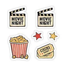 some stickers that are on the side of a white wall with movies and popcorn