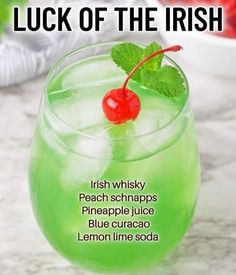 a green drink in a glass with a cherry on the rim and text that reads luck of the irish