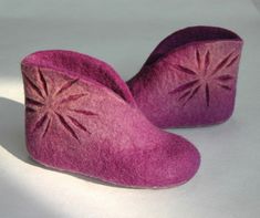 Felted children slippers in beautiful lavender color - excellent gift for birthday or housewarming. Can by made for baby or toddler. Non-slip sole is covered with natural latex. Felt is a perfect material for footwear, especially for children. It is wear proof and warm. The little one's feet will not get cold or overheat. My little sons are running around in felted slippers all day long. Slippers can be ordered in any children size. It usually takes 5-7 workdays to make them and 1-3 weeks to shi Handmade Round Toe Slippers For Gifts, Handmade Closed Toe Slippers As Gift, Gift Booties With Rubber Sole And Round Toe, Gift Rubber Sole Round Toe Booties, Comfortable Purple Round Toe Slippers, Pink Booties With Soft Sole For Gift, Pink Booties With Soft Sole As Gift, Pink Booties With Round Toe As Gift, Pink Round Toe Booties As Gift