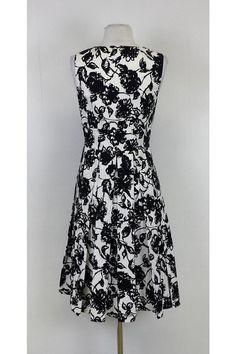 You will be the best dressed at your next garden party with this sweet floral dress. Complement its beautiful floral pattern with bold red stilettos. Add a wide brim sun hat for a sophisticated touch! Size 4 100% cotton - Italian fabric Side zip closure V-neckline Flared skirt Bust 33" Waist 28" Shoulder to hem 41.5" Red Stilettos, Wide Brim Sun Hat, Michael Kors Collection, Sweet Floral, Best Dressed, Italian Fabric, Flared Skirt, Fashion Street, Sun Hat