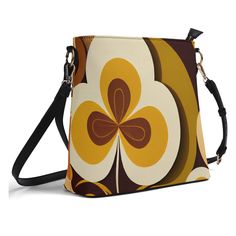 Get groovy with our Flower Power Retro Crossbody Bucket Bag! This Mid Century Modern Vintage Style Handbag is perfect for adding a whimsical touch to any outfit. Securely carry your essentials in style with this funky and functional bag. * PU Leather: High-quality PU leather combines sophistication with durability. * Adjustable Shoulder Strap: Customize the fit with a detachable and adjustable shoulder strap * Secure Zipper Closure: Features a secure zipper closure to protect your belongings. * Retro Yellow Shoulder Bag With Adjustable Strap, Retro Bags With Zipper Closure For Gift, Retro Bag With Zipper Closure As Gift, Retro Shoulder Bag With Zipper Closure, Retro Gift Bag With Zipper Closure, Retro Multicolor Bags With Zipper Closure, Retro Yellow Bag As Gift, Retro Yellow Bag For Gift, Modern Vintage Style