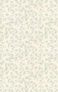 a white and green wallpaper with small floral designs on the back half of it