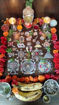 a table topped with lots of different types of food and decorations on top of it