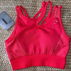 New With Tags Size Small Lululemon Alphalete Beyond Yoga Red Go-dry Racerback Activewear, Pink Athleisure Sports Bra With Seamless Design, Athleisure Pink Sports Bra With Seamless Design, Pink Seamless Sports Bra For Sports, Pink Sleeveless Sports Bra With Seamless Construction, Pink Seamless Sleeveless Sports Bra, Pink Sleeveless Seamless Sports Bra, Pink Tops For Light Sports, Red Stretch Racerback Activewear