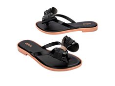 So lovely and luxe, the Slim Flip Flop brings bows to chic poolside style. Featuring a cushy footbed, metallic details and of course, ultra cute bow embellishments, slip these feminine flip flops on when you fancy some extra flair for a casual look. A little glam gets a lot of comfort.