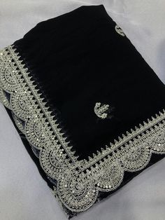 Package Contains: Saree, Blouse, Petticoat Chiffon Silk fabric with C-Pallu Embroidered work & Cutwork Border with Embroidery Work blouse Peice.   Saree  Fabric.     :- Zomato Chiffon Silk  Work        :- Silver codding Sequence Embroidery with cutwork Cut           :- 5.5 mtr    👚👚Blouse 👚👚  Fabric.     :-  Zomato Chiffon Silk Work        :- Embroidery Work  Cut.          :-  0.80 mtr (Un-stitch)  With FREE Saree fall and Piko with matching petticoat. Our Services- Stitching service is also Black Sarees, Festival Saree, Embroidery Work Blouse, Ethnic Saree, Black Saree, Pretty Blouses, Indian Saree, Embroidery Work, Blouse Fabric