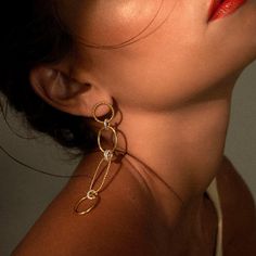 A stunning combination of handcrafted smooth and twisted links, the Connected Earrings are light-weight, assymetrical, and perfectly two-toned. These statement earrings drop 8cm in length with a post back closure. This item is meticulously handmade to order and production time can take 2 - 3 weeks. Please email info@izajewelry.com if you need a rush order. 18k gold vermeil + 925 sterling silver sterling silver post & stud closure total drop length: 80mm / max width: 10mm handmade in Bali Connected Earrings, Earrings Drop, Earrings Gold, Custom Engraving, Gold Vermeil, 3 Weeks, Statement Earrings, Rush, Gold Earrings