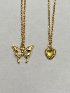 The crystal butterfly necklace comes on a dainty chain  Green amira necklace comes on a dainty chain Green Heart Necklace, Cottagecore Garden, Necklace Butterfly, Crystal Butterfly, Green Heart, Dainty Chain, Necklace Crystal, Emerald Stone, Butterfly Necklace