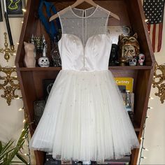 Gently Used White Sheer Mini Dress For Prom, Sleeveless Mini Dress With Sheer Bodice For Wedding, White Sleeveless Dress With Illusion Neckline, White Prom Dress With Illusion Neckline, White Illusion Neckline Dress For Prom, Fitted White Dress With Illusion Neckline, White Sheer Dress For Banquet, White Mini Dress With Sheer Bodice For Cocktail, White Sheer Bodice Mini Dress For Cocktail