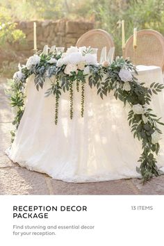 the reception decor package includes white flowers and greenery