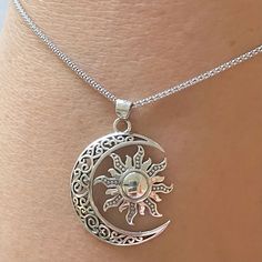 *  Sterling Silver Large Filigree Blazing Sun and Moon Pendant with Italian Necklace, Sun and moon Necklace, promise Sun Pendant, Celestial Pendant, Love Necklace, Silver Sun Necklace, Large Moon Pendant. 925 Stamped. *  The sun symbolizes firmness, strength and power while the moon represents calmness, beauty, nurturing.  *  Perfect gift idea for any occasion: birthday, anniversary, engagement, graduation, bridesmaid, Mother's Day, Valentine's Day, Christmas, promise. *  Your purchase includes a gift box come. Let us know if this is a gift and we can ship directly to the recipient and include a personalized note. *  We greatly appreciate your order with us.  *  Note: Due to the difference between different phone or monitors the pictures may not reflect the actual color of the Ring. **CHAI Spiritual Silver Moon Charm Necklace, Silver Moon Charm Necklace With Sun And Moon Design, Spiritual Moon Jewelry With Sun And Moon Design, Silver Alloy Necklace With Moon Charm, Silver Moon Necklace With Sun And Moon Design, Alloy Jewelry With Moon Charm As Gift, Adjustable Crescent Moon Phase Charm Necklace, Alloy Moon Charm Jewelry For Gift, Silver Crescent Necklace With Sun And Moon Design