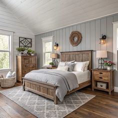 a bedroom with gray walls and wooden furniture in the corner, along with an area rug on the floor