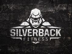 the logo for silverback fitness is painted on a brick wall with an angry gorilla