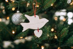 a christmas ornament hanging from a tree