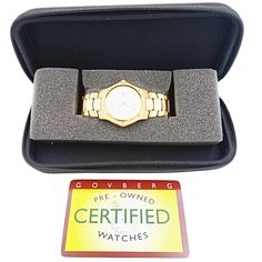 Ebel 36mm Octagon Shape 911 Solid 18K Yellow Gold Watch with Roman Numeral White Dial and Smooth Bezel. Pre-Owned SN# 741***** Brand: Ebel. Gender: Unisex. Case Back: Solid. Weight: 131.9 Grams. Dial Color: Yellow Gold. Case Dimensions: 36mm. Bracelet / Strap: Solid Gold. Bezel Color: 18K Yellow Gold. Condition: Excellent Condition. Movement: Quartz (Movement). Metal Type: 18K Gold Solid Gold. Bracelet Size: Fits up to 7.0" Wrist. Warranty: One (1) Year Service Warranty. Zenith Watches, Coach Watch, Chanel Watch, Rolex Yacht Master, Solid Gold Bracelet, Tag Heuer Watch, New Rolex, Octagon Shape, White Gold Sapphire