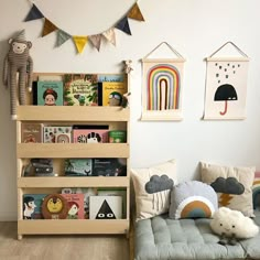 a child's room with bookshelves and toys