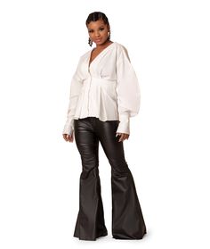 Vegan leatherette flare pants Model is wearing a size 5. True to size Elegant Flare Leather Pants, Elegant Flared Leather Pants, Fall Night Out Flared Hem Pants, Chic Flare Leather Pants, Elegant Flare Leather Pants For Fall, Elegant Flared Leather Pants For Night Out, Chic Flared Leather Pants, Fall Night Out Flares With Flared Hem, Chic Party Flares With Flared Hem