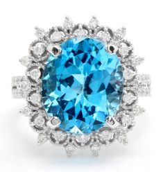 8.00 Carat Natural Blue Swiss Topaz and Diamond Women Ring Made in 14K Solid White Gold Suggested Retail Value $5,999.00 Total Swiss Topaz Weight is - 7.00 Carat Topaz Measurements are - 13.00 X 11.00 mm Total Round Diamonds Carat Weight is - 1.00 Carat Clarity: SI1 Color: G-H RING SIZE: 6 (FREE SIZING AVAILABLE) RING WEIGHT IS 7.5 gram Disclaimer: All weights, measurements and colors are approximate and may vary slightly from the listed dimensions or as seen in the image'' Thanks and goodluck! Etsy Gold Ring, 14k White Gold Ring, White Gold Ring, White Gold Rings, Rings Statement, Gold Ring, Women Rings, Round Diamonds, Statement Rings