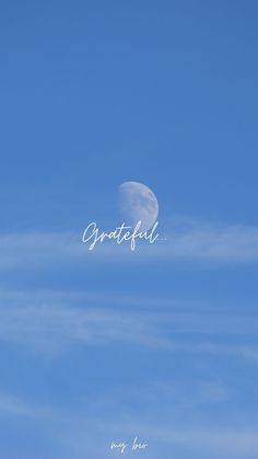 an airplane flying in the blue sky with words that read grateful on it's side