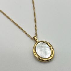 18K Gold Oval Pearl Pendant Necklace Chain,  Pearl Necklace, Abstract Necklace, Dainty Gold Waterproof, High Quality, Gift for Her Material:   - 18K PVD Gold Plated  - Hypoallergenic  - Waterproof  - Non-Tarnish -High-Quality Gold Plating  Measurement:   Chain - 41 cm  Pendant - 25 mm x 19 mm    How to Care for your Jewellery so they will last longer:  - Wipe the jewellery clean every time after wearing  - Store gold jewellery separate from other jewellery  - Keep jewellery away from harsh chemi Gold Oval Clavicle Chain Necklace, Oval Chain Necklace For Gift, Oval Chain Necklace With Adjustable Chain For Gift, White Oval Necklace With Adjustable Chain, Abstract Necklace, Wear Store, Pearl Pendant Necklace, Necklace Dainty, Keep Jewelry