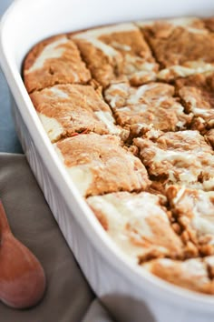 a casserole dish filled with baked dessert items