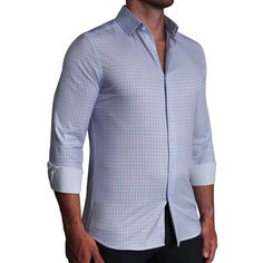 Our signature athletic fit dress shirt crafted from performance stretch fabrics. "The Weston" Light Blue, Pink & Black Plaid is an excellent business casual staple that makes a versatile addition to any dress shirt collection. Fit: More room in the upper body with a tapered waist Fabric Feel: Four-way stretch performance polyester / spandex fabric Fabric Function: Moisture-wicking, lightweight and wrinkle free Styling: Structured semi-spread collar and single button angled cuffs Additional Styli Blue Classic Stretch Shirt, Modern Blue Slim Fit Shirt, Modern Fitted Blue Shirt, Modern Blue Formal Dress Shirt, Modern Blue Dress Shirt For Office, Modern Blue Business Dress Shirt, Modern Blue Dress Shirt For Business, Smart Blue Dress Shirt For Business Casual, Fitted Smart Blue Dress Shirt