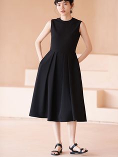 A sleeveless dress with a gently flared hem that gives you the look of a movie actress. This item is sewn high at the waist and creates a beautiful silhouette. Wear it with a cardigan or jacket for all seasons. 
 
 
 
 
 
 
 
 
 
 
 
 
 
 
 
 Size 
 
 
 S size 
 
 
 Length: 110cm 
 Shoulder width: 36cm 
 Bust: 85cm 
 Waist: 68cm 
 
 M size 
 
 Length: 111.5cm 
 Shoulder width: 37cm 
 Bust: 89cm 
 Waist: 72cm 
 
 L size 
 
 Length: 113cm 
 Shoulder width: 38cm 
 Bust: 93cm 
 Waist: 76cm 
 
 XL si Chic A-line Tea Length Dress With Pleated Bodice, Chic A-line Pleated Dress, Elegant Sleeveless A-line Fit And Flare Dress, Elegant A-line Fit And Flare Sleeveless Dress, Chic A-line Dress With Pleated Bodice, Chic A-line Sleeveless Dress With Box Pleat, Chic A-line Dress With Pleated Waist, Flattering A-line Sleeveless Dress For Work, Elegant A-line Sleeveless Dress With Flattering Silhouette