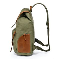 The Milo Backpack is a blend of functional fashion and craftsmanship, designed for the dynamic individual. Made from durable 100% cotton canvas with genuine leather accents, it withstands everyday use. Featuring multiple pockets, an adjustable drawstring closure, recycled nickel-free hardware, and vegetable-based dyes, it highlights eco-friendly style. Versatile carrying options include a top handle and adjustable shoulder straps. Ideal for commutes, getaways, and adventures, the Milo Backpack offers ample storage, including a padded laptop compartment. Handcrafted for unique quality, it is an essential accessory for the modern explorer. Dimensions: 12" W x 15" H x 5" D. | TSD Brand Milo Backpack Green Canvas Bag For Outdoor, Casual Green Canvas Backpack, Khaki Backpack With Pockets For Outdoor Activities, Functional Leather Backpack With Pockets For Outdoor Activities, Khaki Cotton Canvas Bag For Travel, Khaki Leather Backpack For Outdoor Activities, Green Cotton Bag For Outdoor Activities, Modern Canvas Backpack With Adjustable Strap, Casual Green Bags With Leather Trim