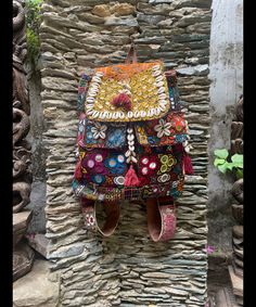 About bag  Indo-gypsy fusion, everyday use hand bag made from Banjara fabrics sourced from Vintage tribal costumes of regions of Rajastan and Gujarat. These are embellished with light catching coins, and intricate bead work tassels. Size - length 15 inches/ width 21 inches Company details:  Company name: Houseoftextile  Contact number: +919784447473  Email id: houseoftextile77@gmail.com  Shipping & custom : Delivery through one of the finest service providers : Skyway, Fedex, UPS  And DHL. Any l Multicolor Handwork Bags For Festive Occasions, Multicolor Embellished Bags For Festive Occasions, Multicolor Handwork Potli Bag For Festivals, Festival Bag With Mirror Work, Bohemian Potli Bag With Handwork, Bohemian Multicolor Potli Bag For Festive Occasions, Bohemian Multicolor Potli Bag For Festive Season, Bohemian Rectangular Potli Bag With Zari Work, Multicolor Bohemian Potli Bag For Festive Occasions