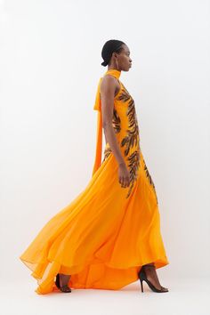 Mesmerise With The Vibrant Depth Of This Maxi Dress, Taking Cues From Movie Theatertic Styles With A Fluted Skirt That Flows With Captivating Depth, Offsetting The Ornate Sequin Feathers That Trace The Halterneck Bodice. This Cascading Piece Calls For Sleek Hair, Gold-Tone Jewels, And Metallic Stilettos To Offset The Artful Embellishments.Halter Necklinesleeveless Bodicesequin Embellishmentsmaxi Length Latest Maxi Dresses, Sleek Hair, Spring Wedding Guest Dress, Ibiza Outfits, Maxi Dress Collection, Open Back Maxi Dress, Mother Of The Bride Outfit, Garden Party Dress, Paris Outfits