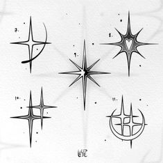 four different star tattoos on white paper