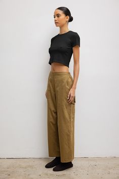 Cut in our anything but basic Kelly Cotton Rib, The Kelly Crop Slim Fit Tee is the perfect high waist pant companion. Featuring a crew neckline, a just right cropped length, and clean, tailored finishing. Shop all styles in this fabric group Cropped Cotton Pants With Pockets, Casual Cropped Bottoms For Work, Everyday Cropped Cotton Bottoms, Versatile Cropped Workwear Bottoms, Chic Cropped Cotton Pants, Versatile Cropped Relaxed Fit Pants, Versatile Cropped Pants With Relaxed Fit, Cotton Crop Top For Workwear, Cotton Workwear Crop Top