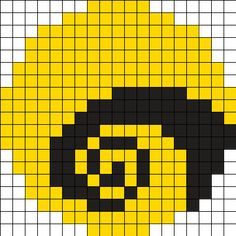 a yellow and black cross stitch pattern with a smiley face