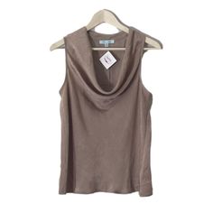 Cowl Neck Sleeveless Top In A Goldish Tone. Chic Brown Sleeveless Camisole, Elegant Brown Sleeveless Camisole, Elegant Sleeveless Brown Tops, Chic Brown Tank Vest, Taupe Fitted Sleeveless Top, Fitted Sleeveless Taupe Top, Fitted Taupe Sleeveless Top, Brown Sleeveless Tank Top For Spring, Brown Sleeveless Blouse For Spring