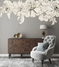 a large white flower wall decal in a living room