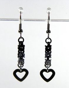 Black Dangle Heart Pierced Earrings, Black Heart Drop Earrings, Gothic Black Heart-shaped Earrings, Handmade Black Dangle Heart Earrings, Handmade Black Heart Dangle Earrings, Black Heart Earrings With Ear Wire, Black Heart-shaped Earrings With Hooks, Heart-shaped Black Earrings, Handmade Black Heart Earrings