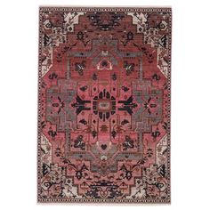 a red rug with an intricate design on the front and back side, in various colors