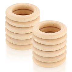 two stacks of wooden rings sitting on top of each other