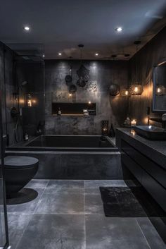 a modern bathroom with black and gray decor