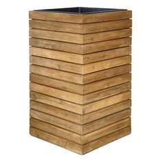 a tall wooden planter sitting on top of a white wall