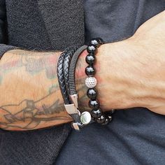 #mensbracelets #fathersdaygifts #forziani Men Stacked Bracelets, Black Spiritual Stackable Jewelry, Luxury Masculine Everyday Bracelets, Masculine Black Everyday Bracelets, Black Bohemian Stackable Stretch Bracelet, Pyrite Bracelet, Hook Bracelet, Double Wrap Bracelet, Braided Leather Bracelet