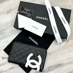 This Is A Chanel Classic Everyday Wallet. 8” L X 5” H X 1” D. Very Rare. 100% Authentic. Zipper Closure. Silver Tone Hardware With Chain Link Accents. Exterior Is A Black Quilted Leather With White Cc Logo At Front With Slip Pocket At Back. Interior Is A Hot Pink Embossed Cc Leather And Nylon With 8 Credit Card Slots, 1 Slip Pocket, 1 Zipper Pocket For Coins And 2 Bill Compartments. Pre Loved, Barely Used. Faint Interior Scuffs. Minor Tarnish At Interior Zipper Pull. Mostly Stored In Box. Pristi Chanel Card Box, Receipt Holder, Chanel Box, Wallet Organization, Black Quilt, Chanel Black, Cc Logo, Quilted Leather, Very Rare