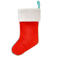 a red and white christmas stocking hanging from a green ribbon on a white background