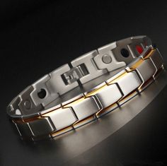 Bold and unique, this bracelet makes an adorable gift for people who are looking for a men's bracelet. Crafted in titanium steel, the bracelet shows a unique and pristine look. Just take this handsome design. It won't disappoint you! Material: Titanium SteelPlating Color: Silver, Yellow Gold Modern Silver Magnetic Bracelets, Modern Silver Magnetic Bracelet, African Hair Wrap, Injection Moulding Process, Power Bracelet, Energy Power, Wrist Jewelry, Style Star, Injection Molding