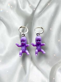 These earrings are small purple creepy mini baby doll earrings! Eerie! Spice up your style with these unique dangle earrings! With hypoallergenic huggies for your ear! Creepy Earrings, Alternative Earrings, Emo Jewelry, Doll Earrings, Unique Dangle Earrings, Jewelry Y2k, Earrings Gothic, Funny Earrings, Huggie Earrings Silver