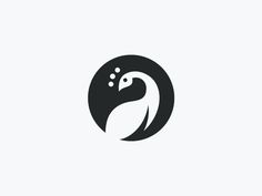 a black and white logo with an image of a bird on it's head