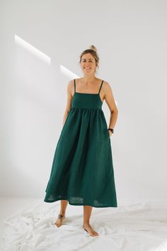 "Aruba Dress, Wide Linen Summer Dress, Boho Green Linen Dress, Beach Cami Linen Dress, Bridesmaids Linen Dress, Beach Oversized Linen Dress * Name: ARUBA dress * Handmade * 100 % wished and softened Lithuanian linen * Linen has OEKO-TEX 100 standards   * 205 g/m2 * Colour: DARK GREEN * Inner pockets * Perfect for maternity * Length of the dress - 129 cm (top - 34 cm, skirt - 95 cm)  The model is 178 cm height and is wearing size S. Choose your size (your body measurements) : Size XS:   US 0-2 / Beach A-line Sundress, Green A-line Midi Dress For Beach, Green A-line Midi Dress For The Beach, A-line Green Midi Dress For The Beach, Green Linen Dress For Vacation, Beach Style Midi Length Linen Sundress, Green Summer Midi Dress For The Beach, Green Summer Midi Dress For Beach, Summer Sleeveless Midi Dress For Holidays