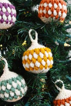 crocheted ornaments hanging from a christmas tree